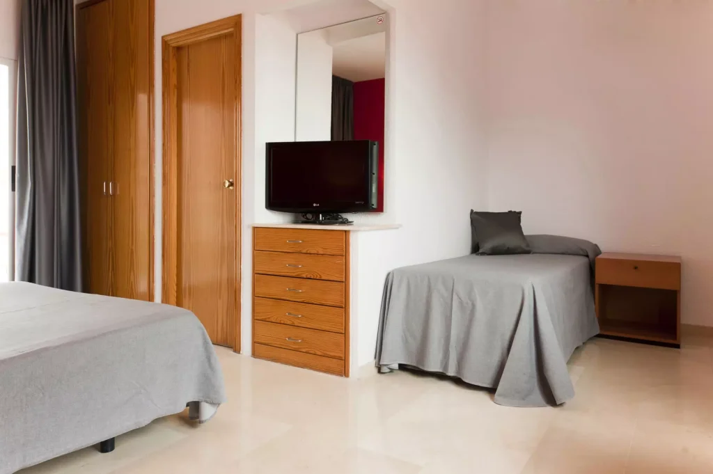Foto de una habitación familiar en el Hotel Palmeral Foto de una habitación familiar en el Hotel Palmeral